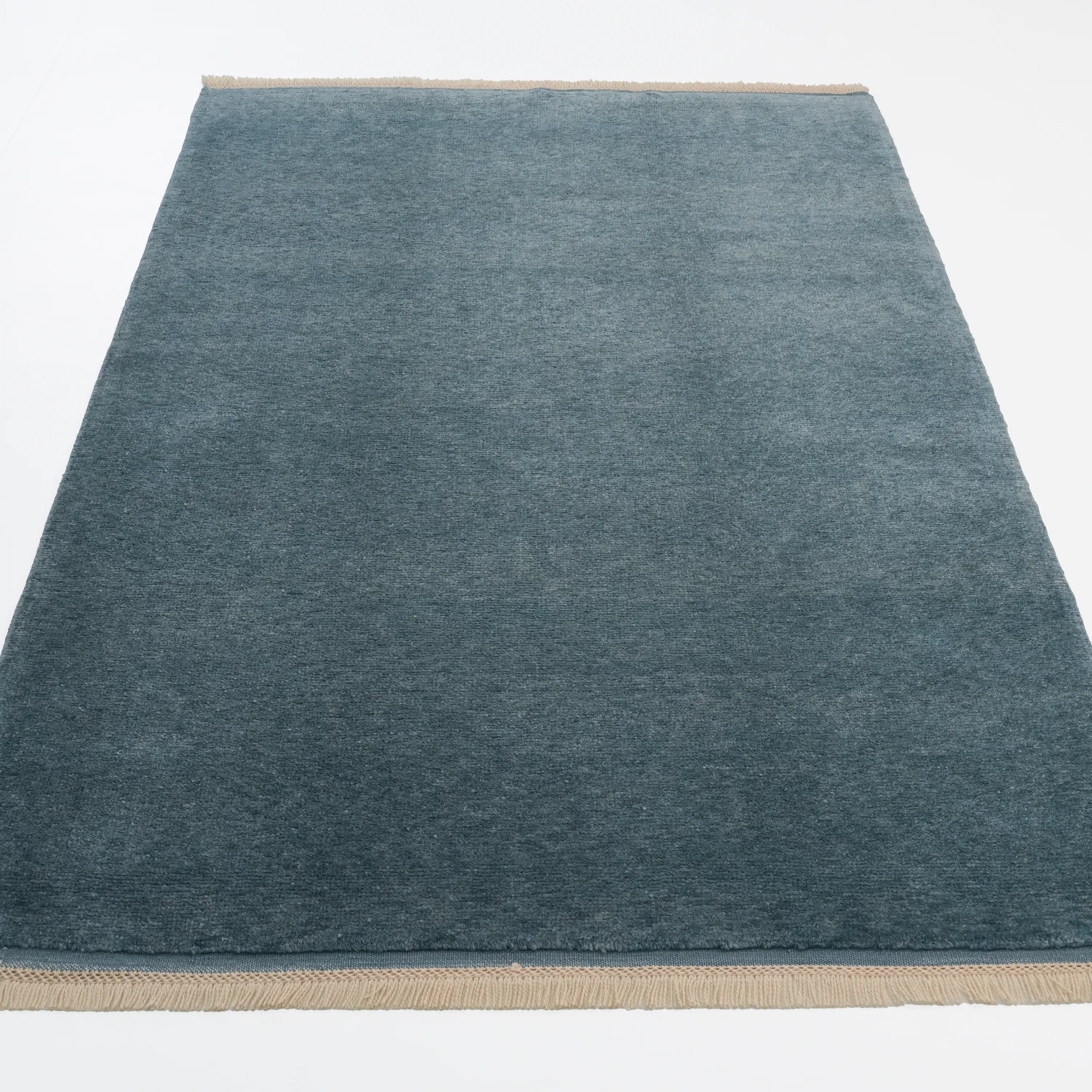 El Dokuma Sade Desenli Mavi Yün Halı