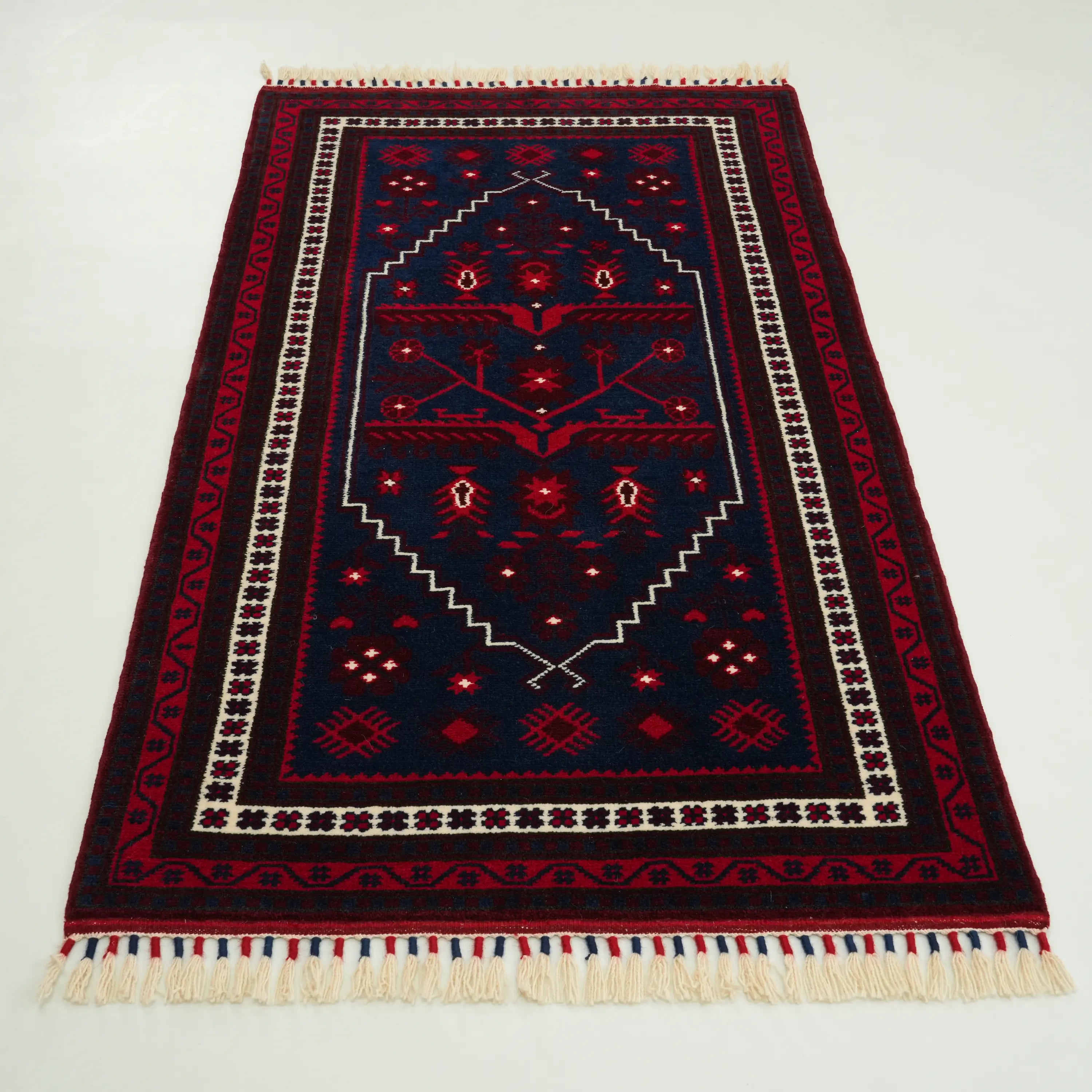 El Dokuma Yağcıbedir Desenli Lacivert Yün Etnik Halı