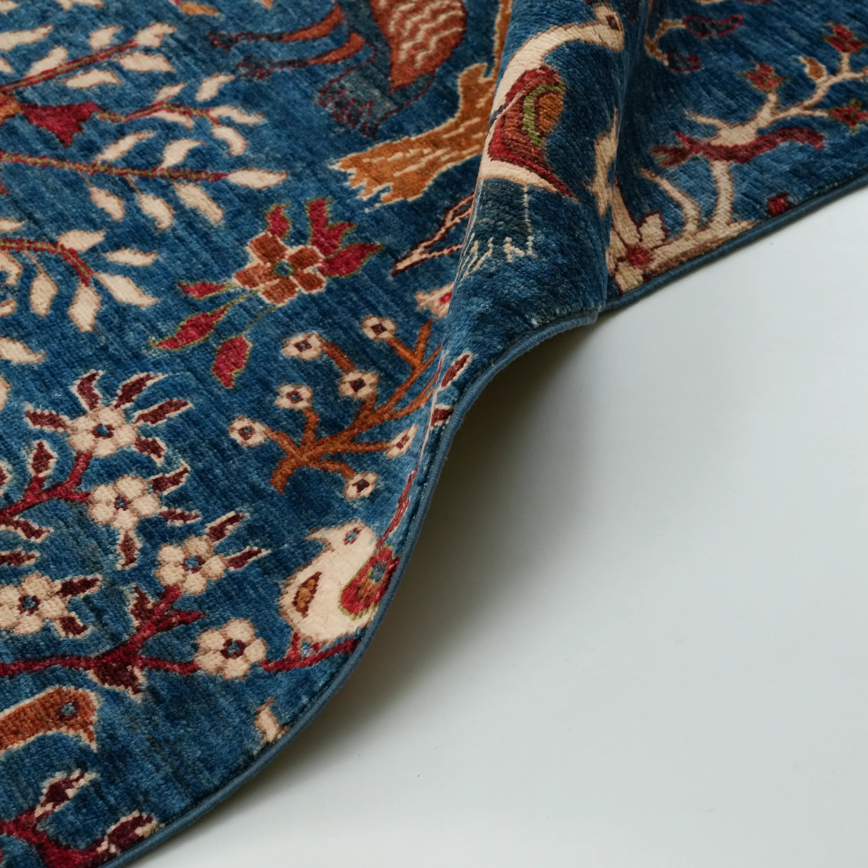 Mihman Series Handwoven Flower Pattern Blue Wool Rug