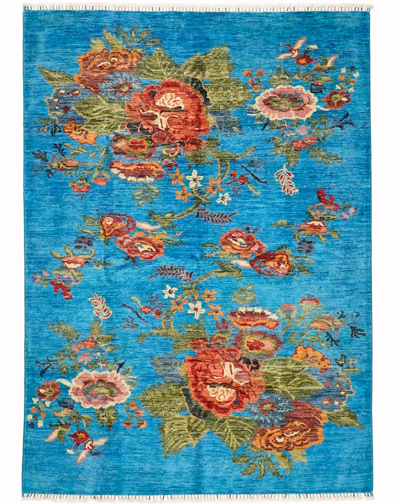 Siyah, krem ve kobalt maviyle: Kafkasya kökenli el dokuma Karabağ halısı.