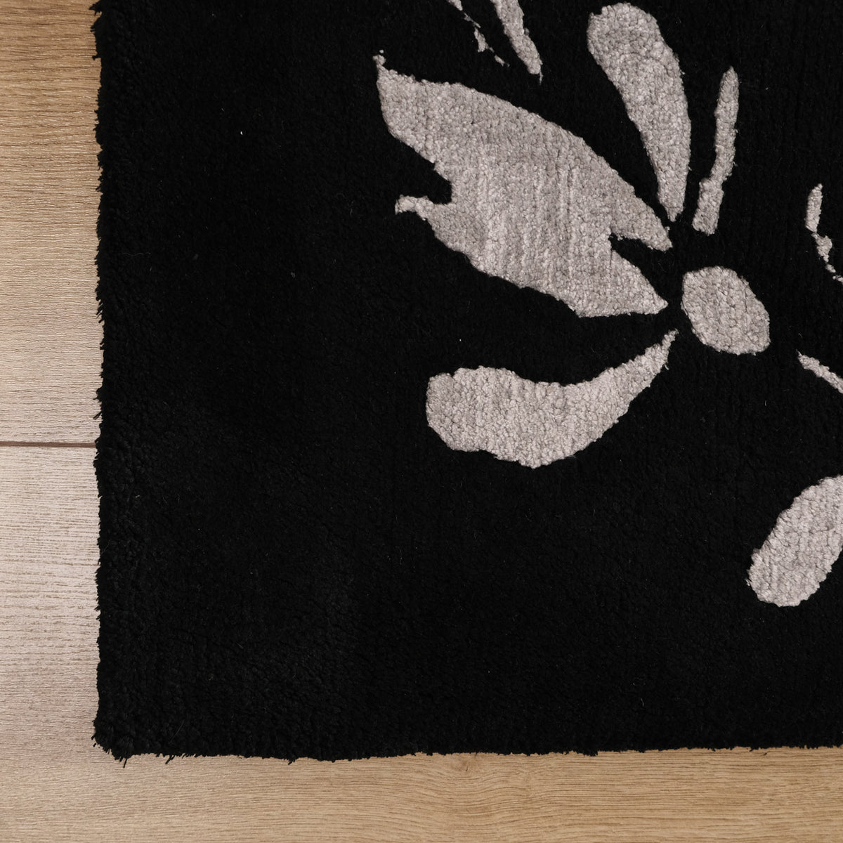 Black Floral Hand-Knotted Wool Rug — modern design