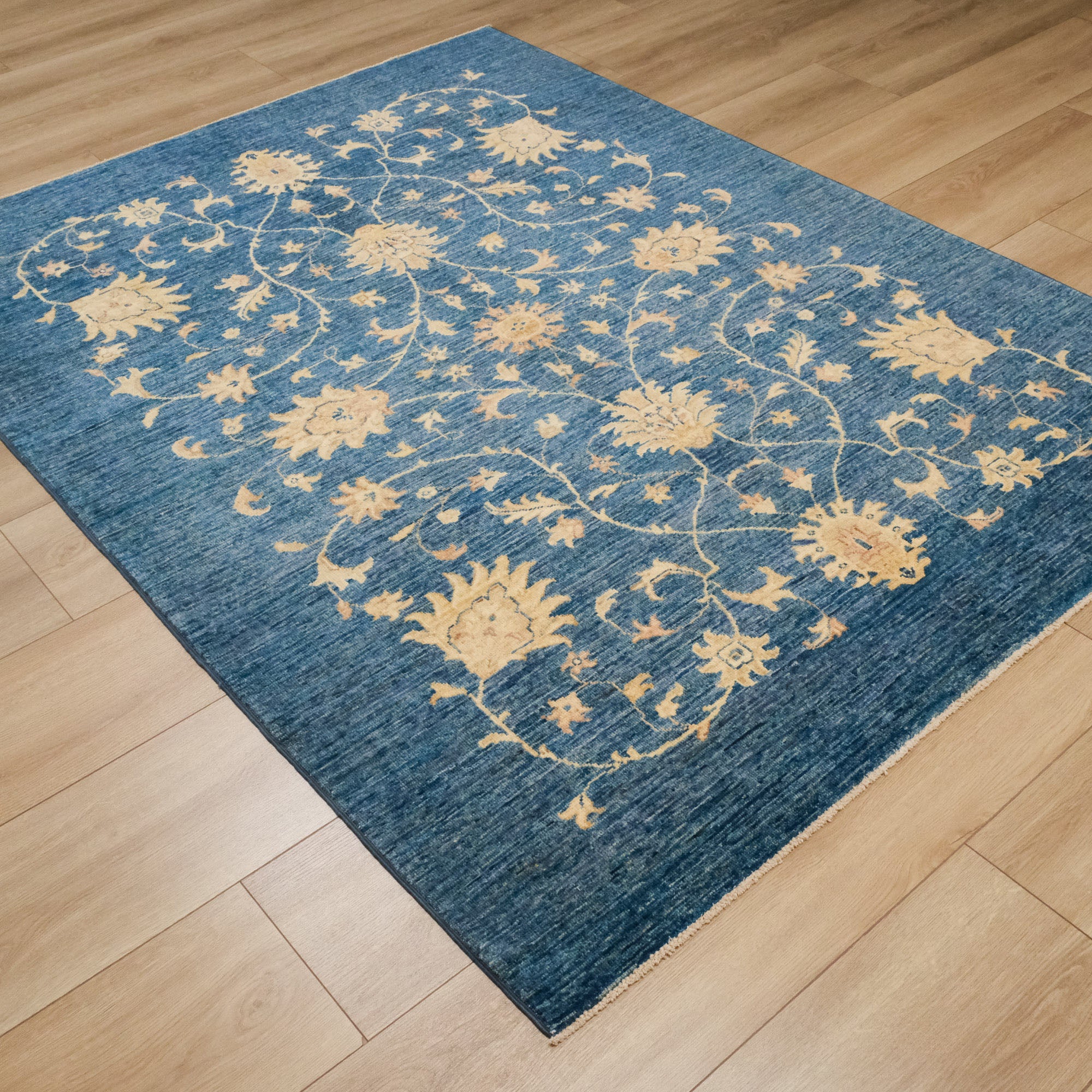 Hand-Woven Flower Patterned Blue Wool Carpet