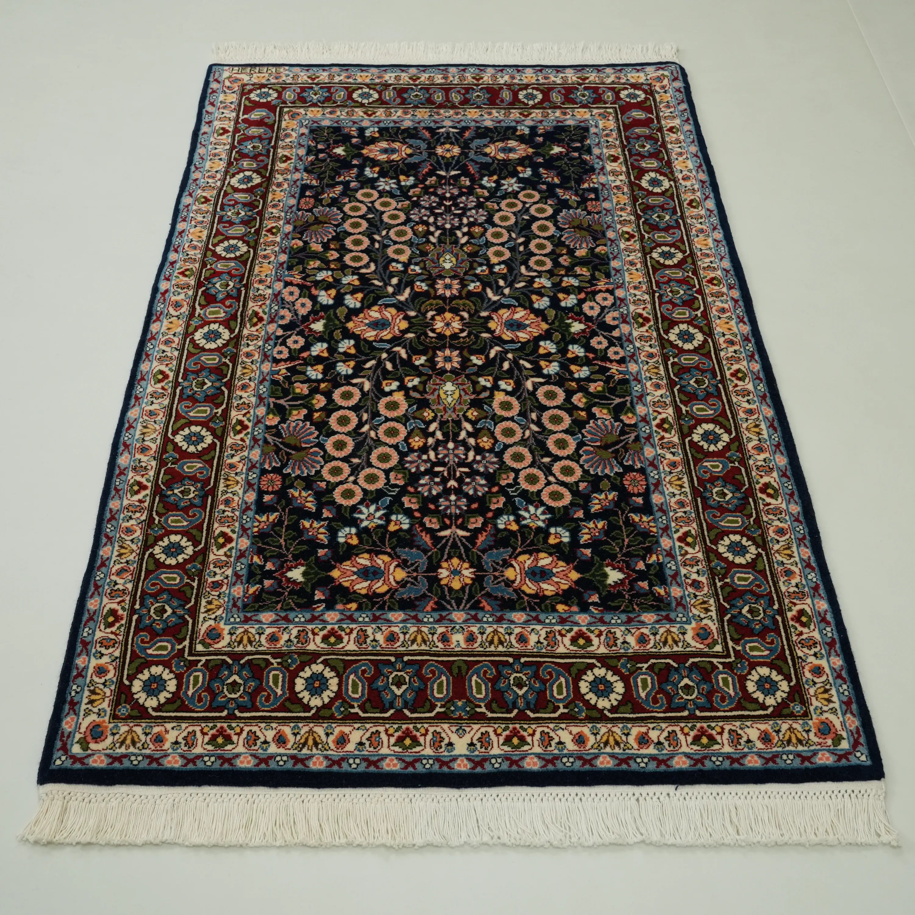 Handwoven Hereke Patterned Navy Blue Wool Rug