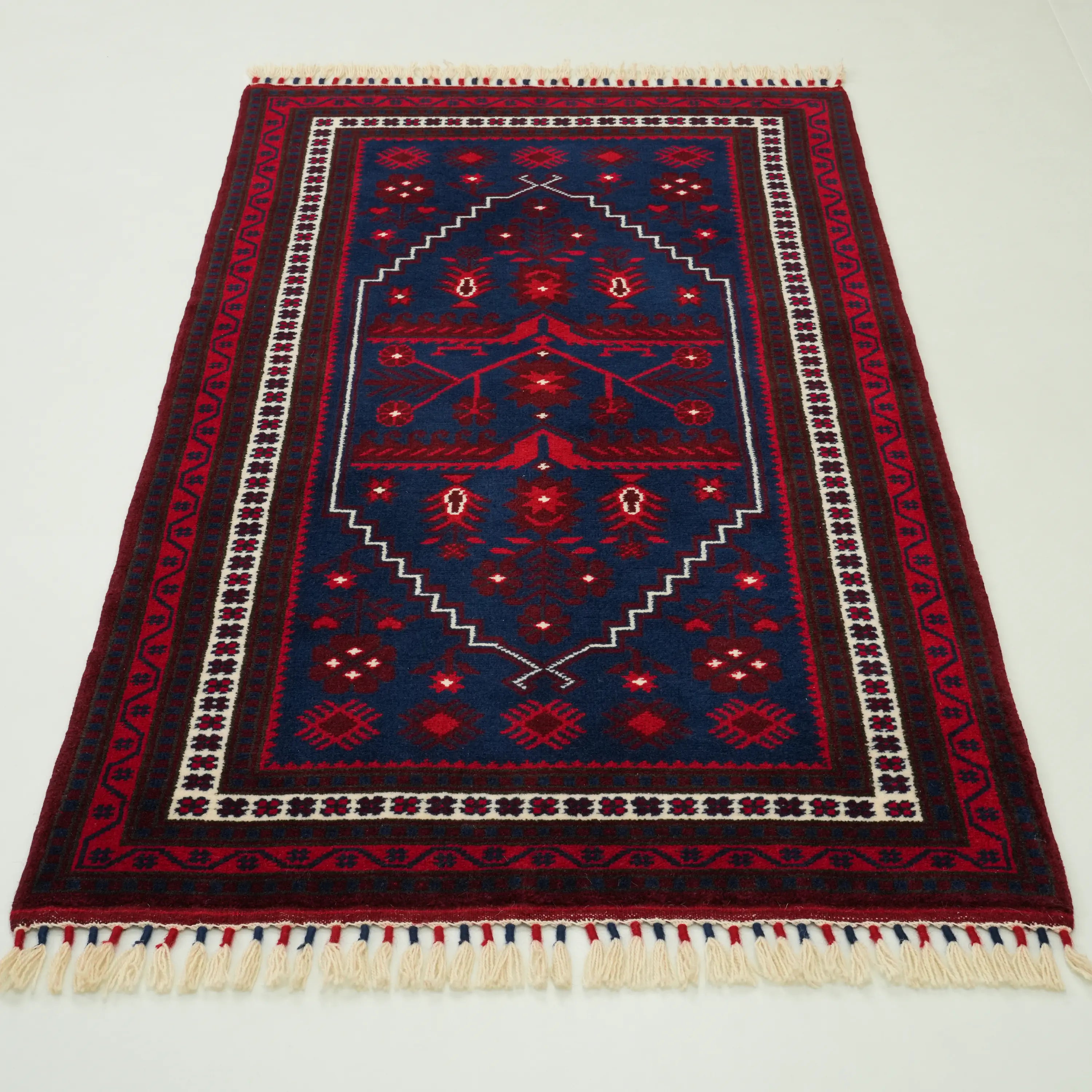 El Dokuma Yağcıbedir Desenli Lacivert Yün Etnik Halı