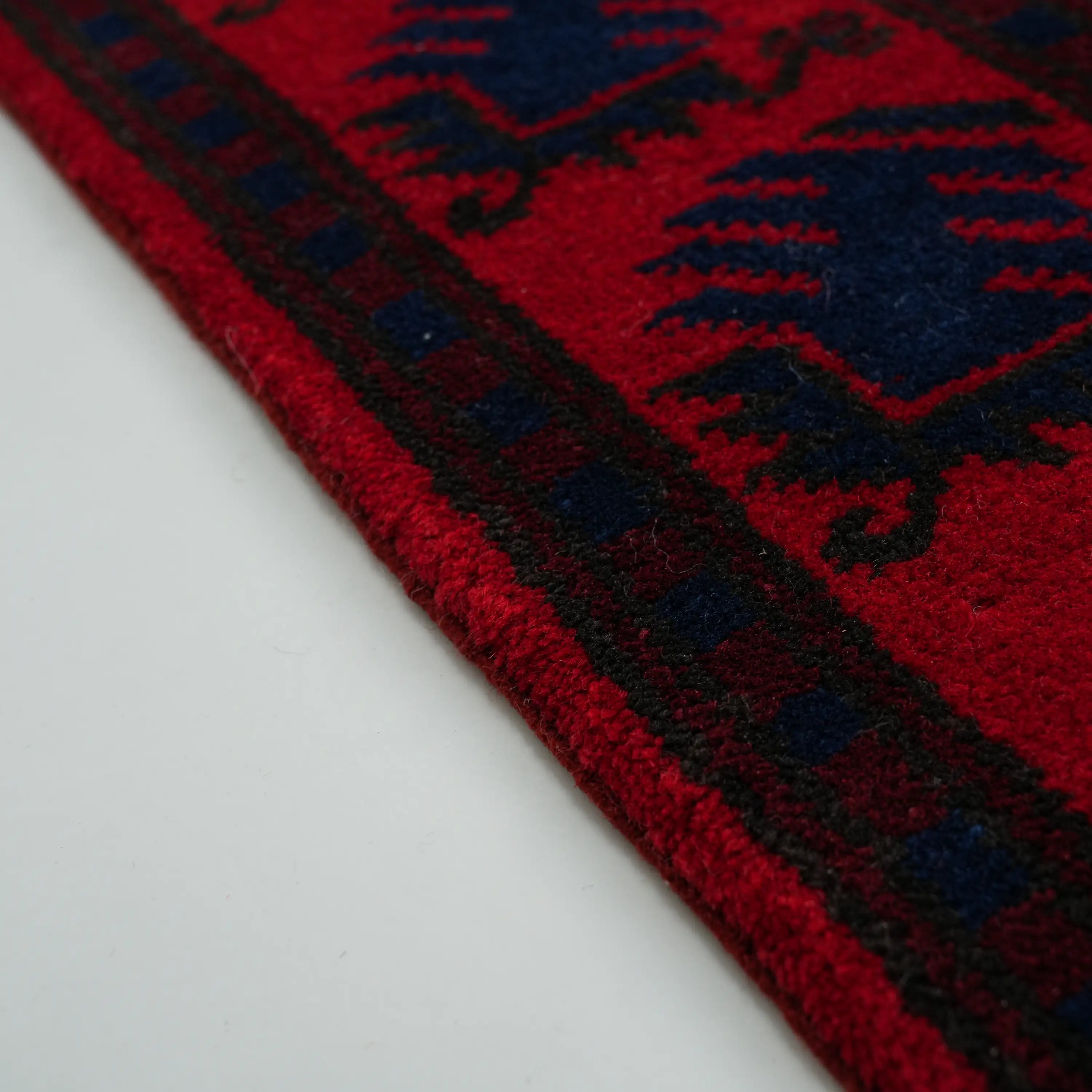 El Dokuma Yağcıbedir Desenli Lacivert Yün Halı