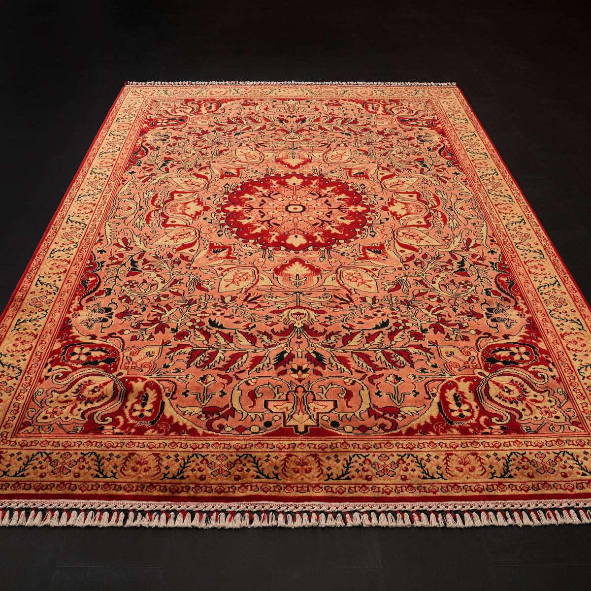 Zade Series red rug — close angled view, wide border and cream fringe