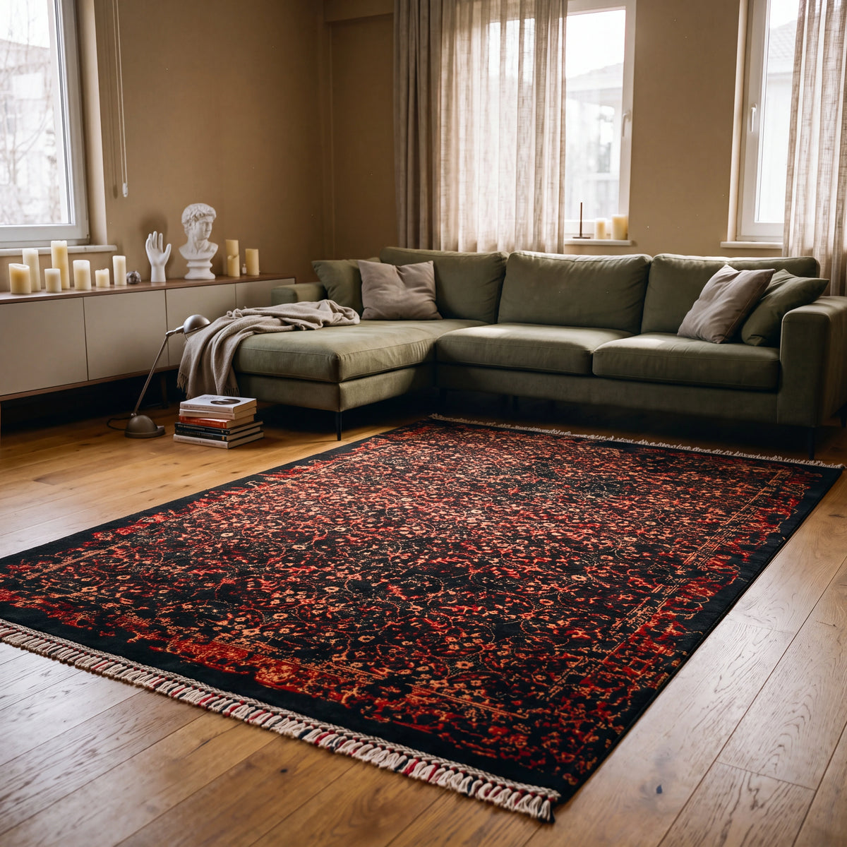 Zade Series vintage-patterned rug — in a room with a green sectional, before candles and a bust