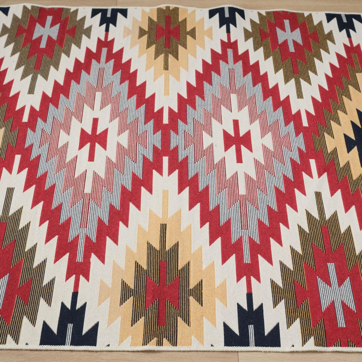 Kehribar Series multicolor Anatolian-pattern kilim — field up close; nested diamonds and stepped edges