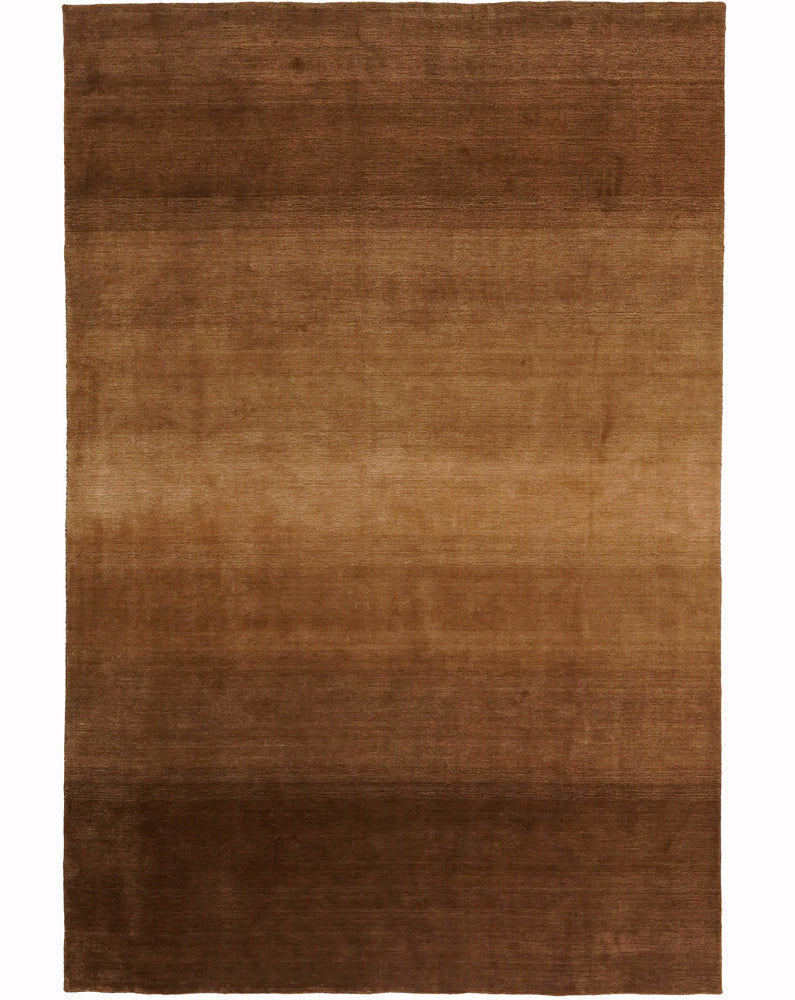 Degrade kahverengi, el dokuması doğal hissiyat: Hindistan'dan minimalist esinti.