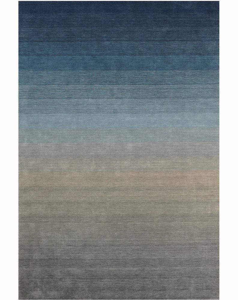 Derin lacivert, desensiz saf yün: Nika serisinden minimal ve şık tasarım.