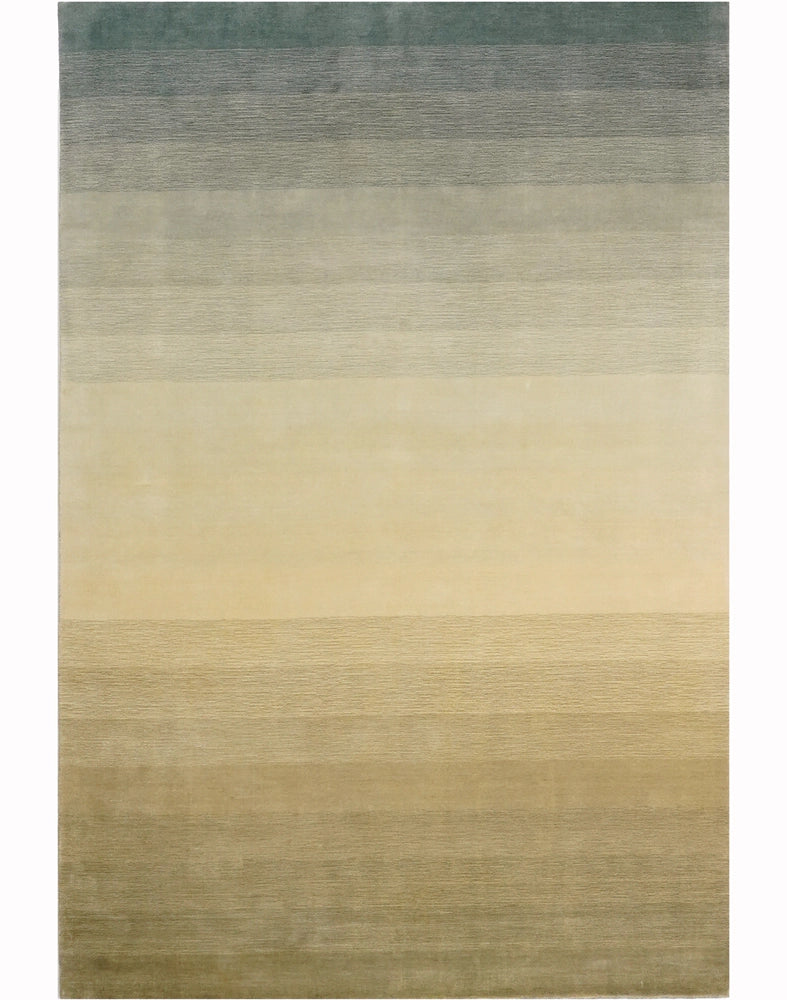 Ormandan gökyüzüne, %100 yün ile dokunan güçlü minimal tasarım.